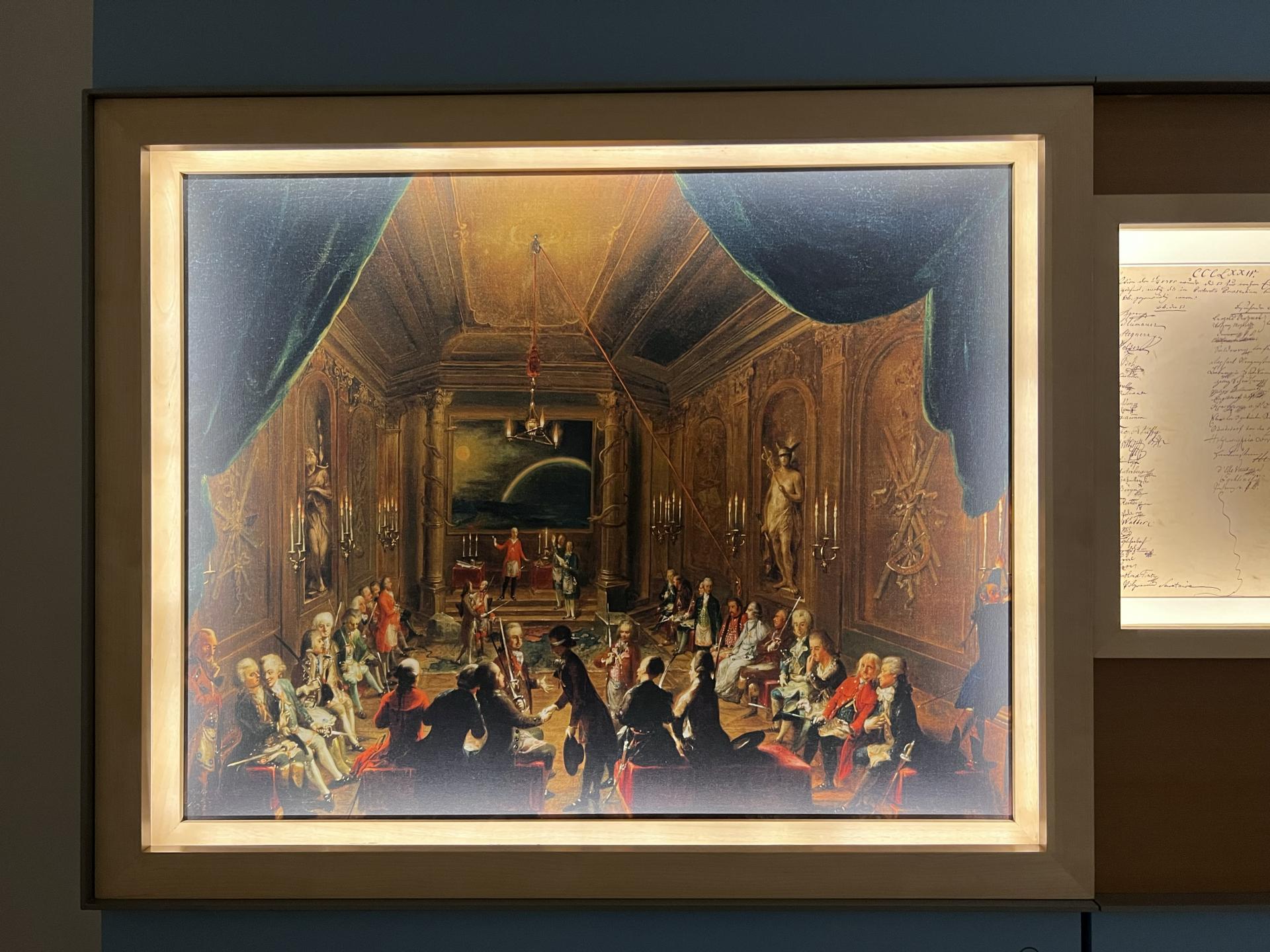 ©オーストリア政府観光局/ TYO
フリーメイソンの会合を描いた絵画。画面右端にモーツァルトの姿が見えます