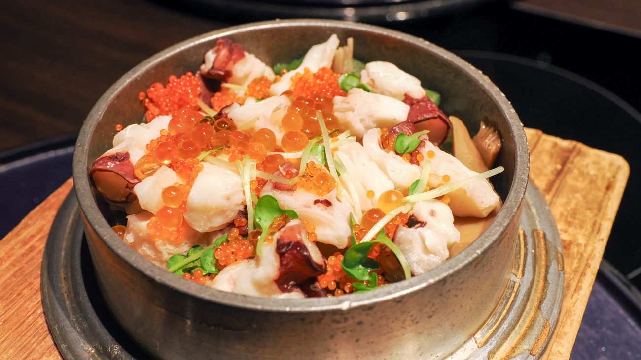 "Kamameshi" with octopus from Enbetsu Town in Hokkaido and mountain vegetables, topped with flying fish roe and salmon roe