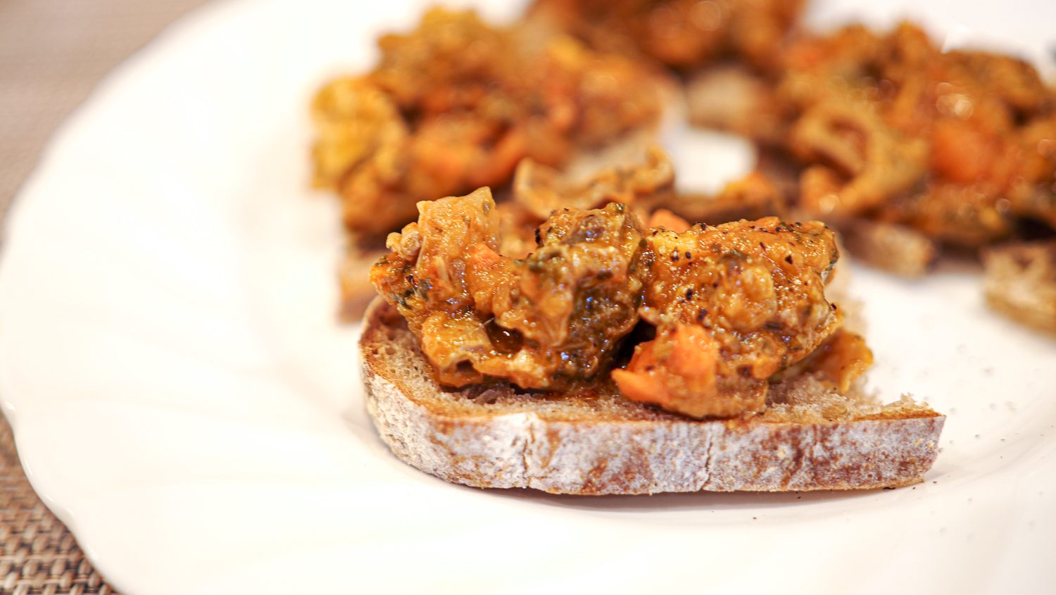 Bruschetta topped with offal of the pork from Hokkaido and nduja sauce
