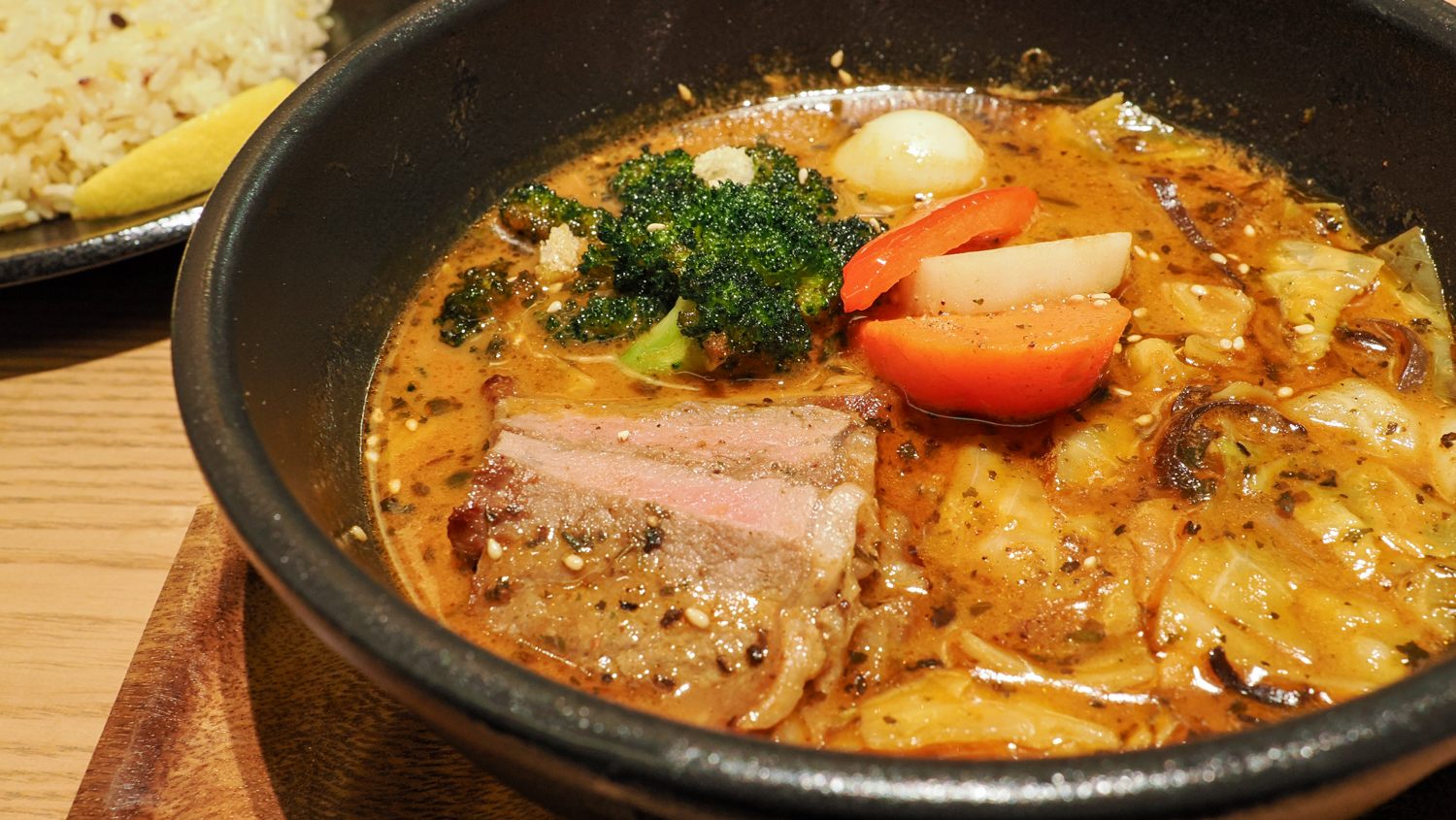 Soup Curry with beef steak from Hokkaido as a limited time menu item for the newly opened restaurant