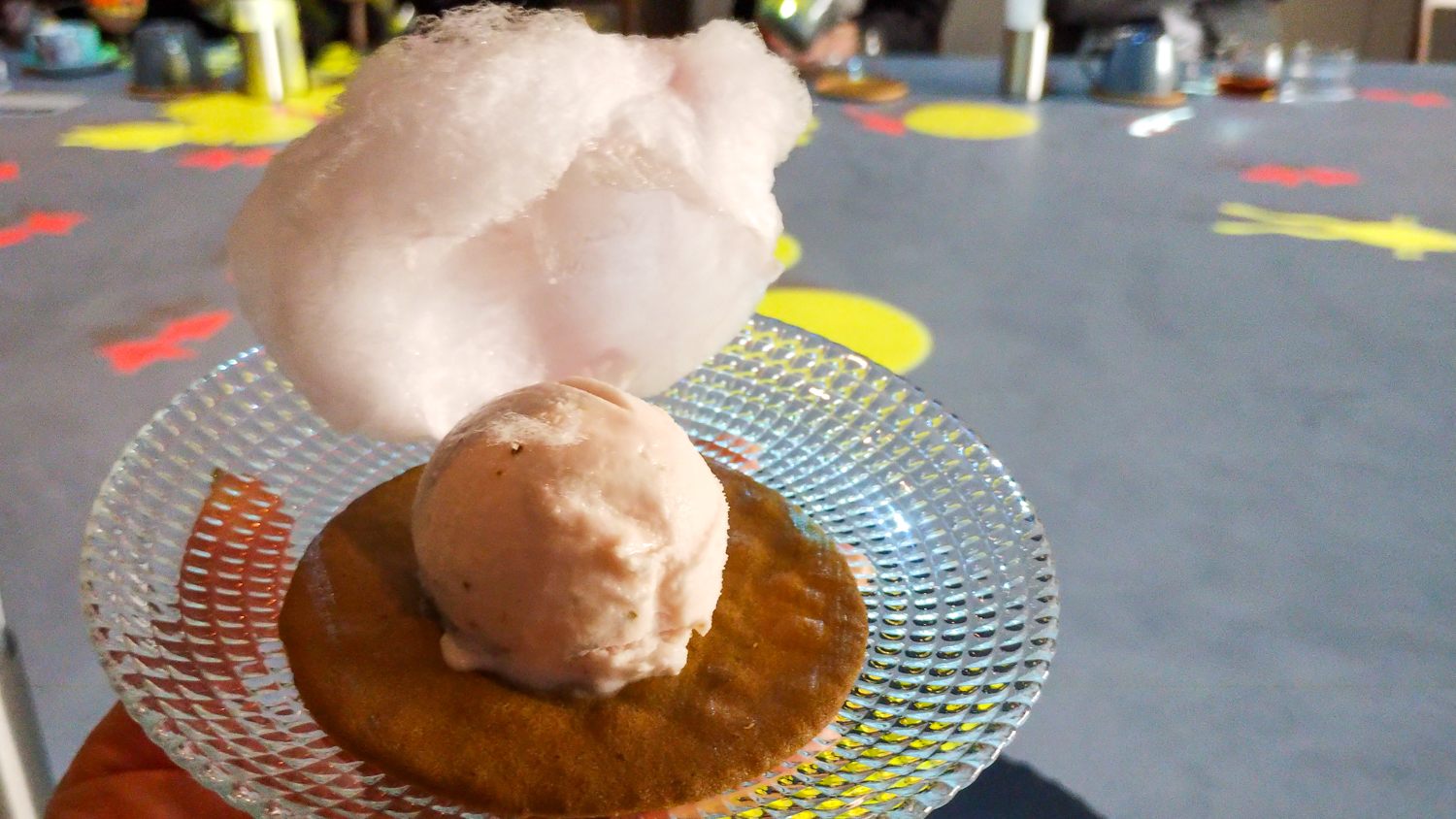 Sakukra flavored ice cream in the cotton candy for "Sakura and strawberry with haselnuts parfait"