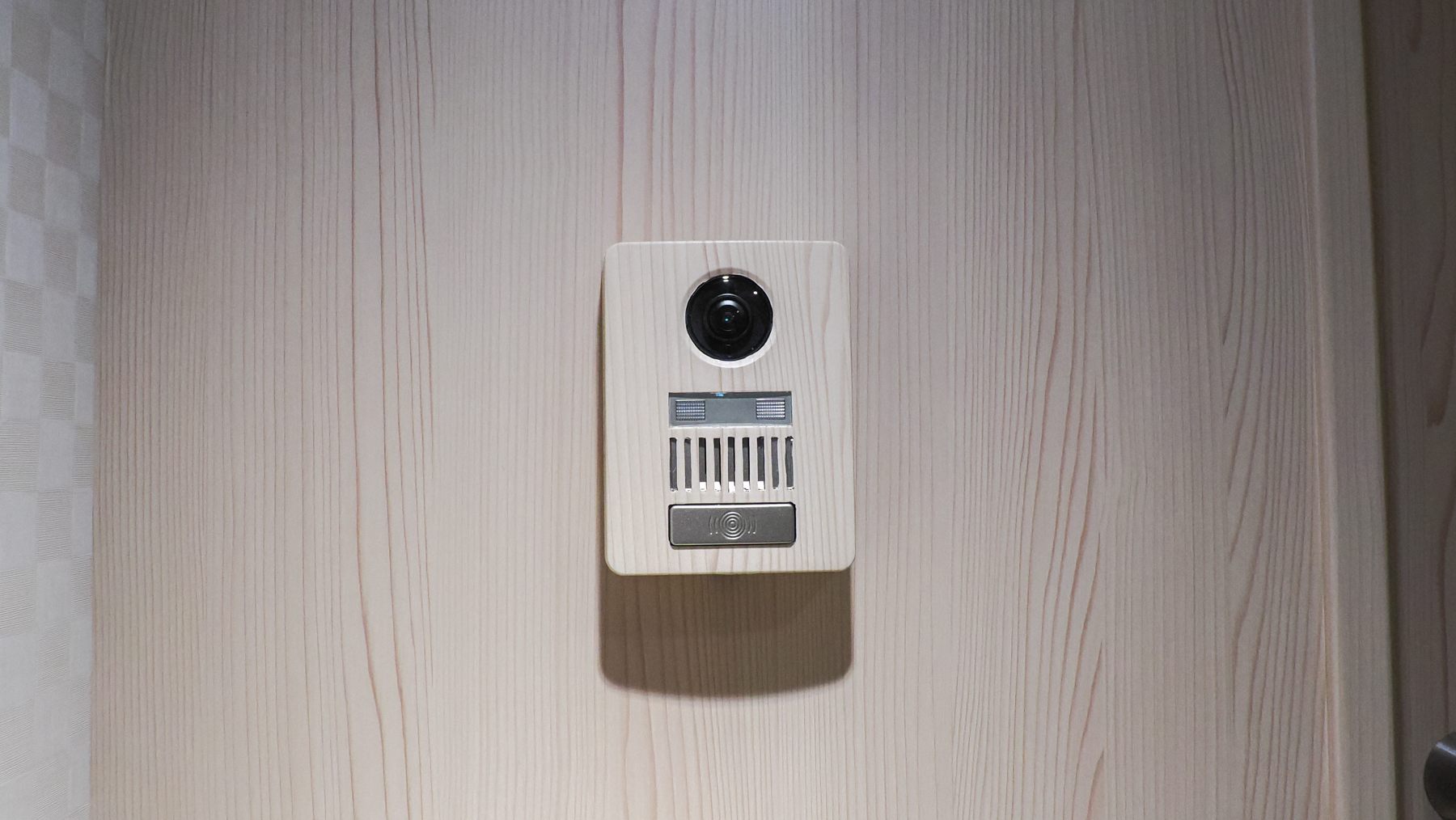 An intercom at the entrance to call the staff before entering