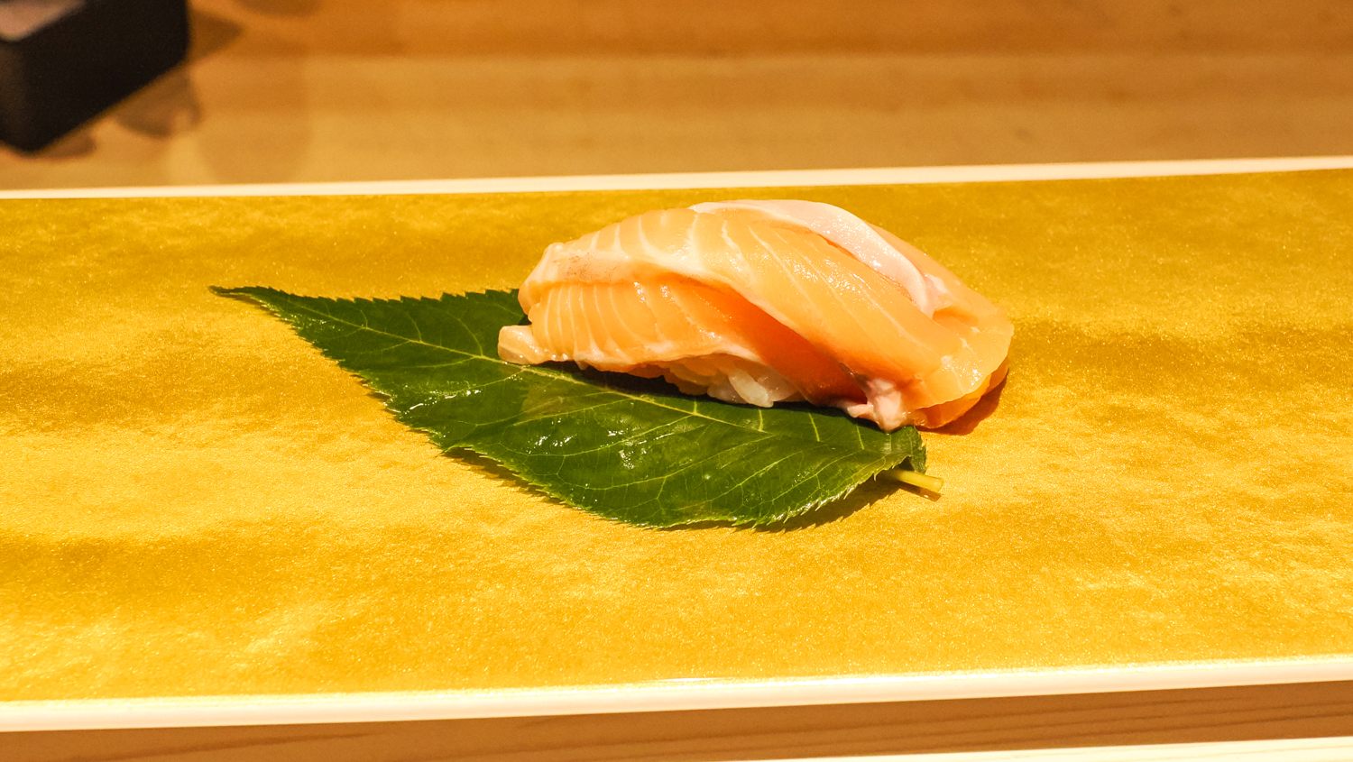 Trout sushi on the Sakura leaf 