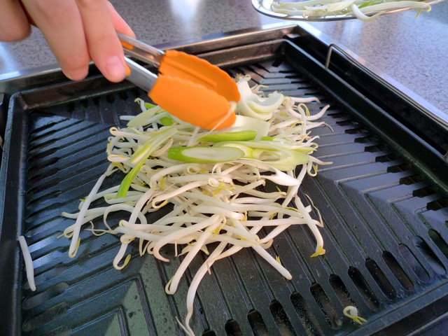 Place vegetables on the skillet.