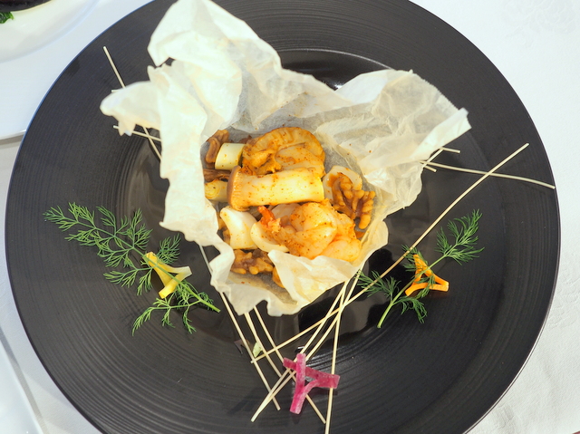 Sea foods and walnut seasoned with rainbow spice baked in parcel